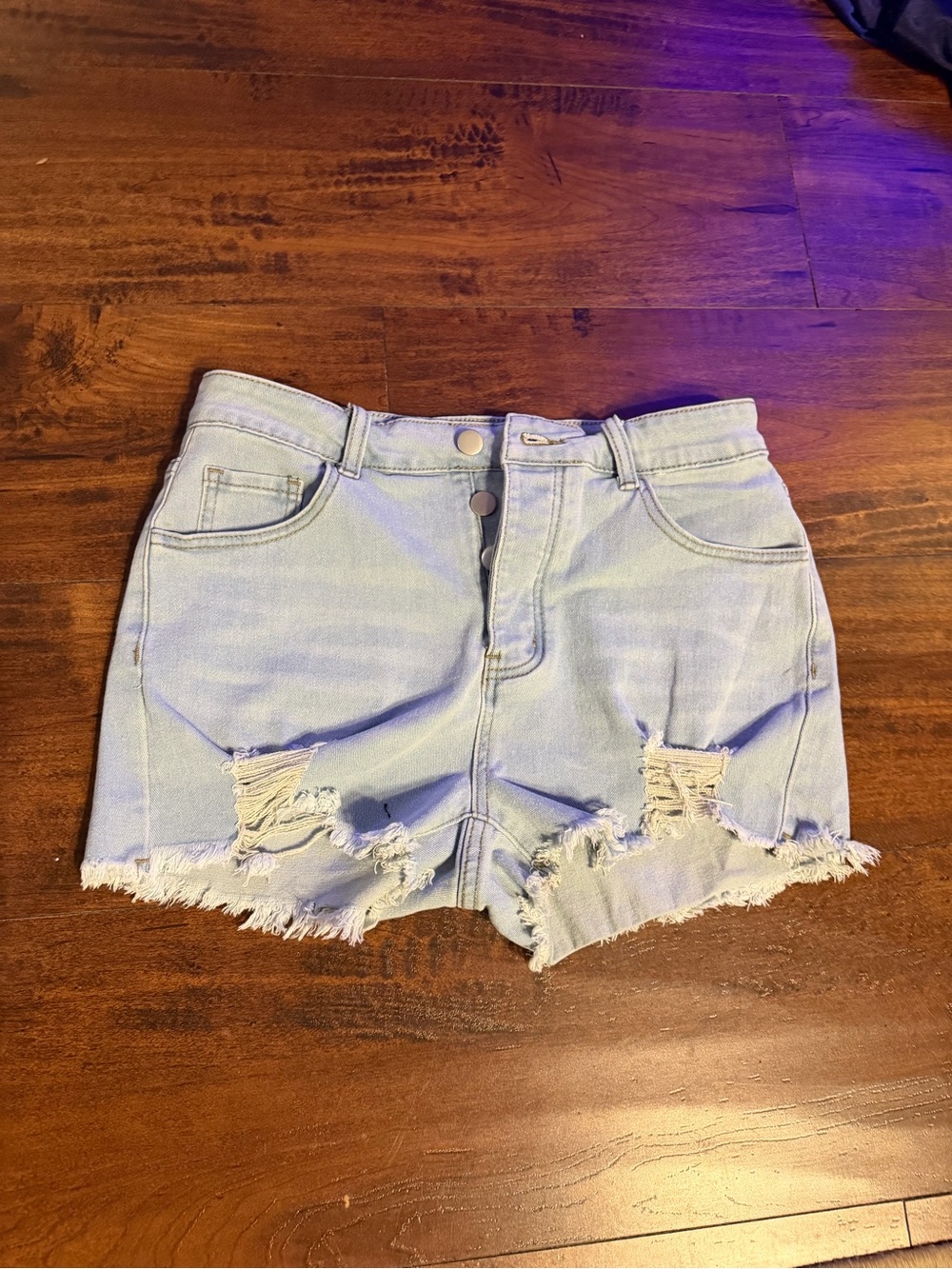 High-Rise Light Blue Distressed Denim Shorts